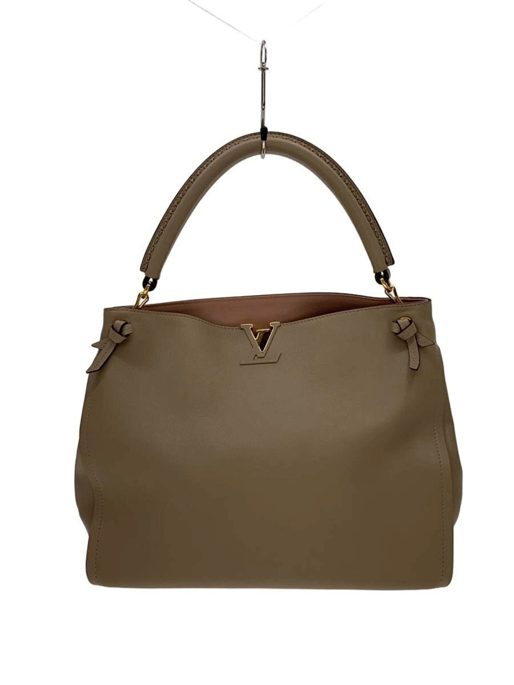 Louis Vuitton Tournon Hobo smooth leather goldtone LV logo